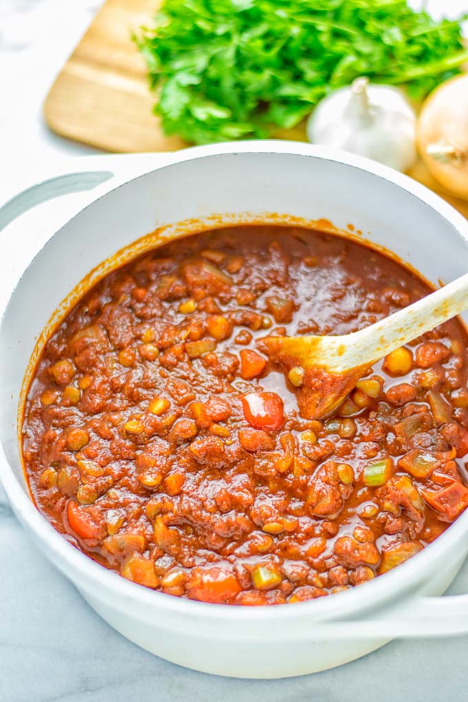 This Chickpea Lentil Bolognese is naturally vegan, gluten free and so super easy to make in one pot. It's amazing over your favorite pasta for dinner, lunch, meal preparation or a great dairy free alternative for work lunch. #vegan #glutenfree #dairyfree #vegetarian #onepotmeals #dinner #lunch #mealprep #worklunchideas #chickpeas #lentils #chickpeabolognese #lentilbolognese #contentednesscooking