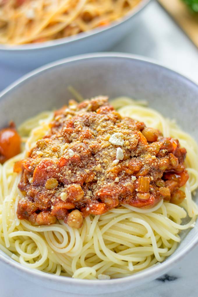 This Chickpea Lentil Bolognese is naturally vegan, gluten free and so super easy to make in one pot. It's amazing over your favorite pasta for dinner, lunch, meal preparation or a great dairy free alternative for work lunch. #vegan #glutenfree #dairyfree #vegetarian #onepotmeals #dinner #lunch #mealprep #worklunchideas #chickpeas #lentils #chickpeabolognese #lentilbolognese #contentednesscooking