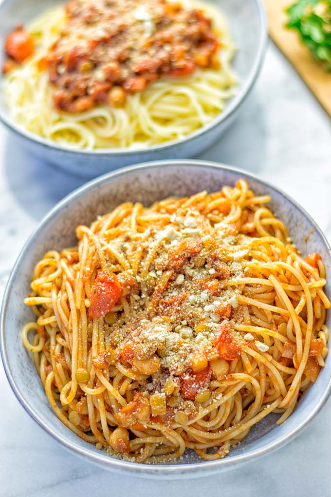 This Chickpea Lentil Bolognese is naturally vegan, gluten free and so super easy to make in one pot. It's amazing over your favorite pasta for dinner, lunch, meal preparation or a great dairy free alternative for work lunch. #vegan #glutenfree #dairyfree #vegetarian #onepotmeals #dinner #lunch #mealprep #worklunchideas #chickpeas #lentils #chickpeabolognese #lentilbolognese #contentednesscooking