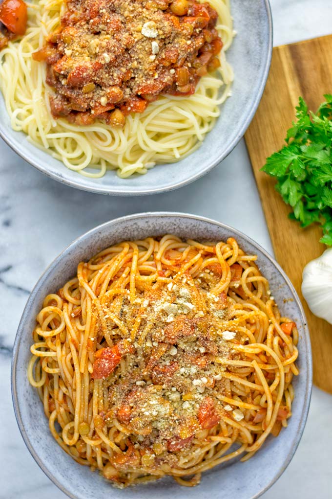 This Chickpea Lentil Bolognese is naturally vegan, gluten free and so super easy to make in one pot. It's amazing over your favorite pasta for dinner, lunch, meal preparation or a great dairy free alternative for work lunch. #vegan #glutenfree #dairyfree #vegetarian #onepotmeals #dinner #lunch #mealprep #worklunchideas #chickpeas #lentils #chickpeabolognese #lentilbolognese #contentednesscooking