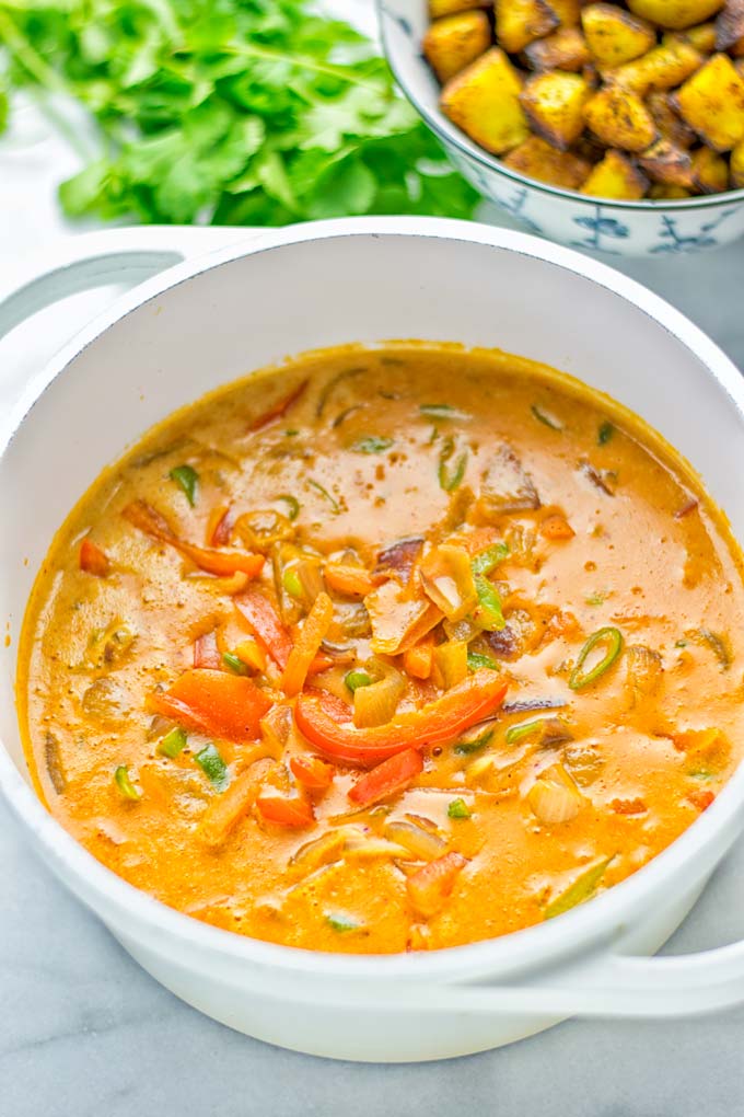 Amazingly mouthwatering Massaman Curry with Roasted Potatoes. So easy and delicious. It's naturally vegan, gluten free and so satisfying. Try it now for lunch, meal preparation, work lunch and dinner. From the first to the last bite you will know it's a keeper and winner for everyone. #vegan #glutenfree #dairyfree #vegetarian #dinner #lunch #curry #contentednesscooking #mealprep #massamancurry #worklunchideas