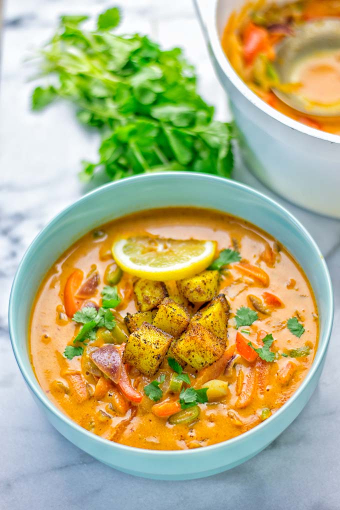 Amazingly mouthwatering Massaman Curry with Roasted Potatoes. So easy and delicious. It's naturally vegan, gluten free and so satisfying. Try it now for lunch, meal preparation, work lunch and dinner. From the first to the last bite you will know it's a keeper and winner for everyone. #vegan #glutenfree #dairyfree #vegetarian #dinner #lunch #curry #contentednesscooking #mealprep #massamancurry #worklunchideas