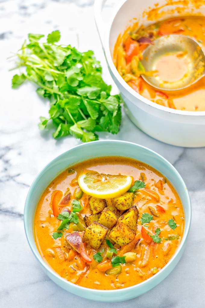 Amazingly mouthwatering Massaman Curry with Roasted Potatoes. So easy and delicious. It's naturally vegan, gluten free and so satisfying. Try it now for lunch, meal preparation, work lunch and dinner. From the first to the last bite you will know it's a keeper and winner for everyone. #vegan #glutenfree #dairyfree #vegetarian #dinner #lunch #curry #contentednesscooking #mealprep #massamancurry #worklunchideas