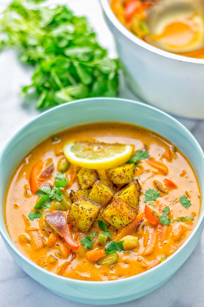 Amazingly mouthwatering Massaman Curry with Roasted Potatoes. So easy and delicious. It's naturally vegan, gluten free and so satisfying. Try it now for lunch, meal preparation, work lunch and dinner. From the first to the last bite you will know it's a keeper and winner for everyone. #vegan #glutenfree #dairyfree #vegetarian #dinner #lunch #curry #contentednesscooking #mealprep #massamancurry #worklunchideas