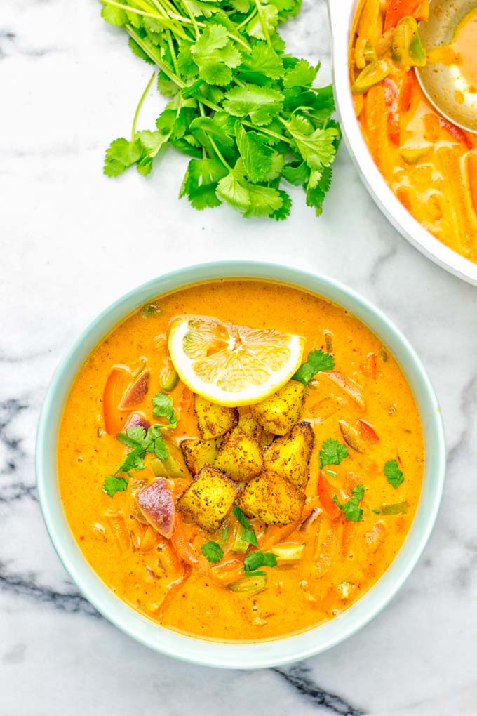 Amazingly mouthwatering Massaman Curry with Roasted Potatoes. So easy and delicious. It's naturally vegan, gluten free and so satisfying. Try it now for lunch, meal preparation, work lunch and dinner. From the first to the last bite you will know it's a keeper and winner for everyone. #vegan #glutenfree #dairyfree #vegetarian #dinner #lunch #curry #contentednesscooking #mealprep #massamancurry #worklunchideas