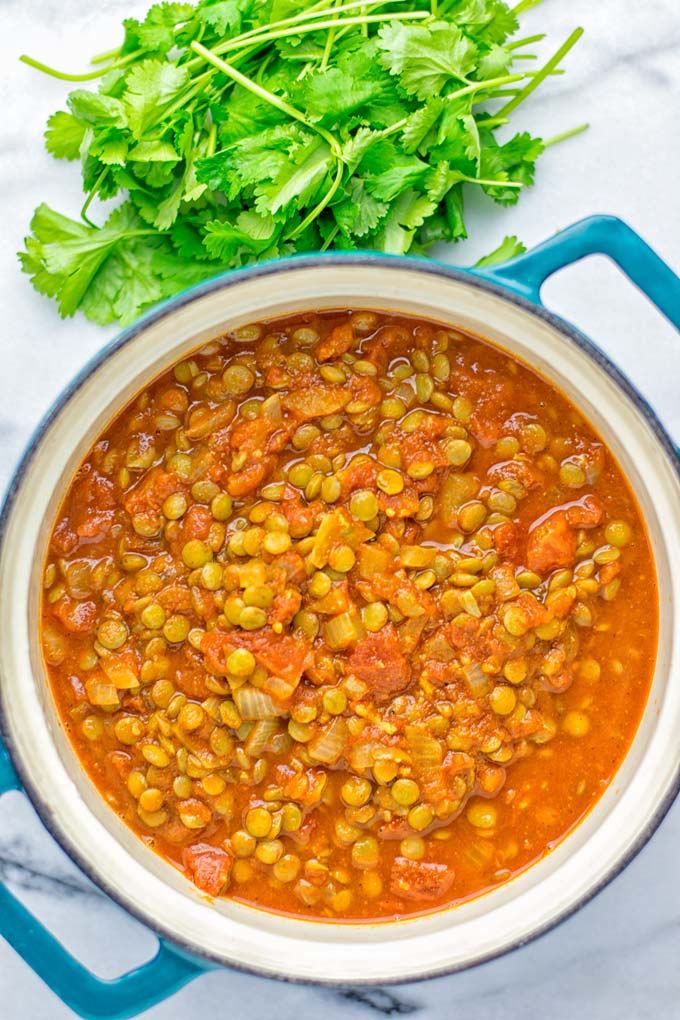 Amazingly tasty Moroccan Spiced Lentils super easy to make in one pot and packed with fantastic flavors. A super easy idea for lunch, dinner, meal prep and work lunch. Enjoy them plain, or over rice, so yummy! Try it now and you know what I'm taking about! #vegan #glutenfree #dairyfree #vegetarian #onepotmeals #lentils #moroccan #lunch #dinner #mealprep #worklunchideas #contentednesscooking #easyfood