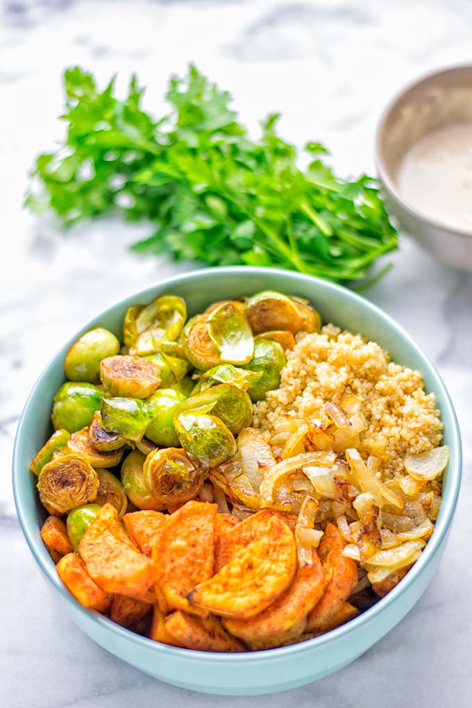 This Cajun Sweet Potato Brussels Sprout Salad is naturally vegan, gluten free and super easy to make. It's so delicious for lunch, dinner, meal prep, work lunch, holidays and Christmas. Try it now, make this keeper again and again. #vegan #glutenfree #dairyfree #vegetarian #contentednesscooking #mealprep #worklunchideas #dinner #lunch #brusselsproutsalad #cajunsweetpotatoes #holidayfood #christmasrecipes #roastedbrusselssprouts #christmasfood #holidayrecipes