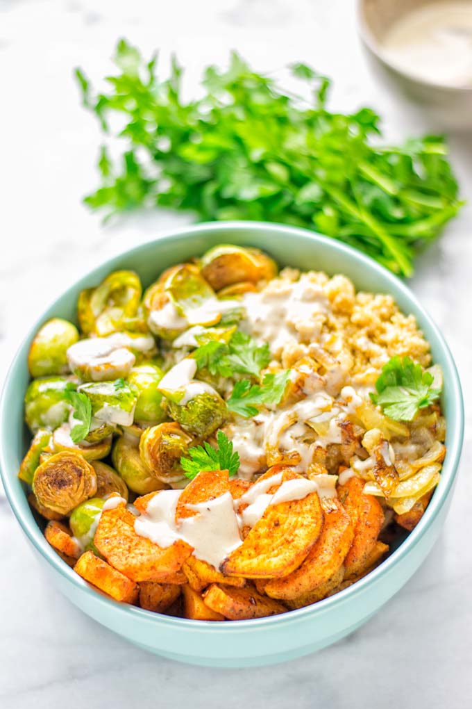 This Cajun Sweet Potato Brussels Sprout Salad is naturally vegan, gluten free and super easy to make. It's so delicious for lunch, dinner, meal prep, work lunch, holidays and Christmas. Try it now, make this keeper again and again. #vegan #glutenfree #dairyfree #vegetarian #contentednesscooking #mealprep #worklunchideas #dinner #lunch #brusselsproutsalad #cajunsweetpotatoes #holidayfood #christmasrecipes #roastedbrusselssprouts #christmasfood #holidayrecipes
