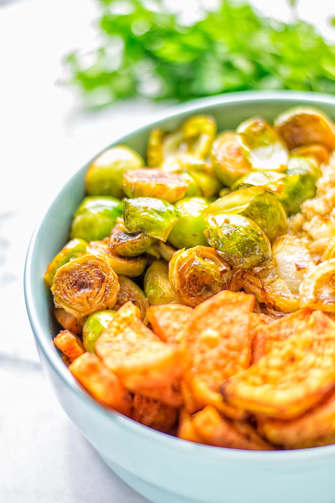 This Cajun Sweet Potato Brussels Sprout Salad is naturally vegan, gluten free and super easy to make. It's so delicious for lunch, dinner, meal prep, work lunch, holidays and Christmas. Try it now, make this keeper again and again. #vegan #glutenfree #dairyfree #vegetarian #contentednesscooking #mealprep #worklunchideas #dinner #lunch #brusselsproutsalad #cajunsweetpotatoes #holidayfood #christmasrecipes #roastedbrusselssprouts #christmasfood #holidayrecipes