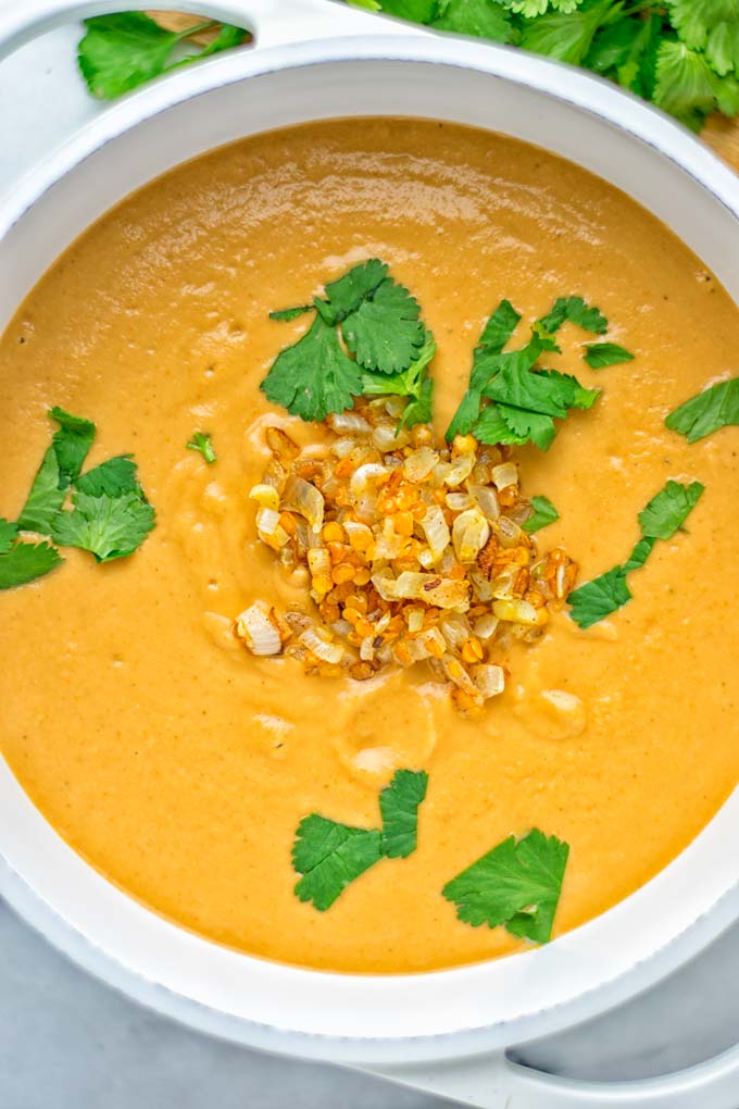 This Egyptian Red Lentil Soup is entirely vegan, gluten free, and so delicious. Packed with a delicious spice mix which take it to a whole new level. Try it now for dinner, lunch, meal preparation. You know what I'm talking about, yum! #vegan #glutenfree #dairyfree #vegetarian #lentils #dinner #lunch #mealprep #worklunchideas #redlentils #redlentilsoup #contentednesscooking #soup