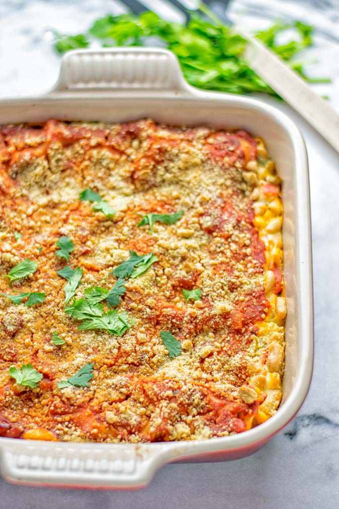 Super easy and insanely delicious White Chili Lasagna. Entirely vegan, gluten free and seriously so addictive. It's fantastic for dinner, lunch, meal preparation, work lunch that the whole family will love. Also a keeper for the holidays and date night. If you're looking for an easy lasagna recipe try this, now. #vegan #dairyfree #glutenfree #vegetarian #lasagna #mealprep #worklunchideas #whitechili #whitechilirecipes #holidays #dinner #lunch #datenightrecipesdinner #contentednesscooking