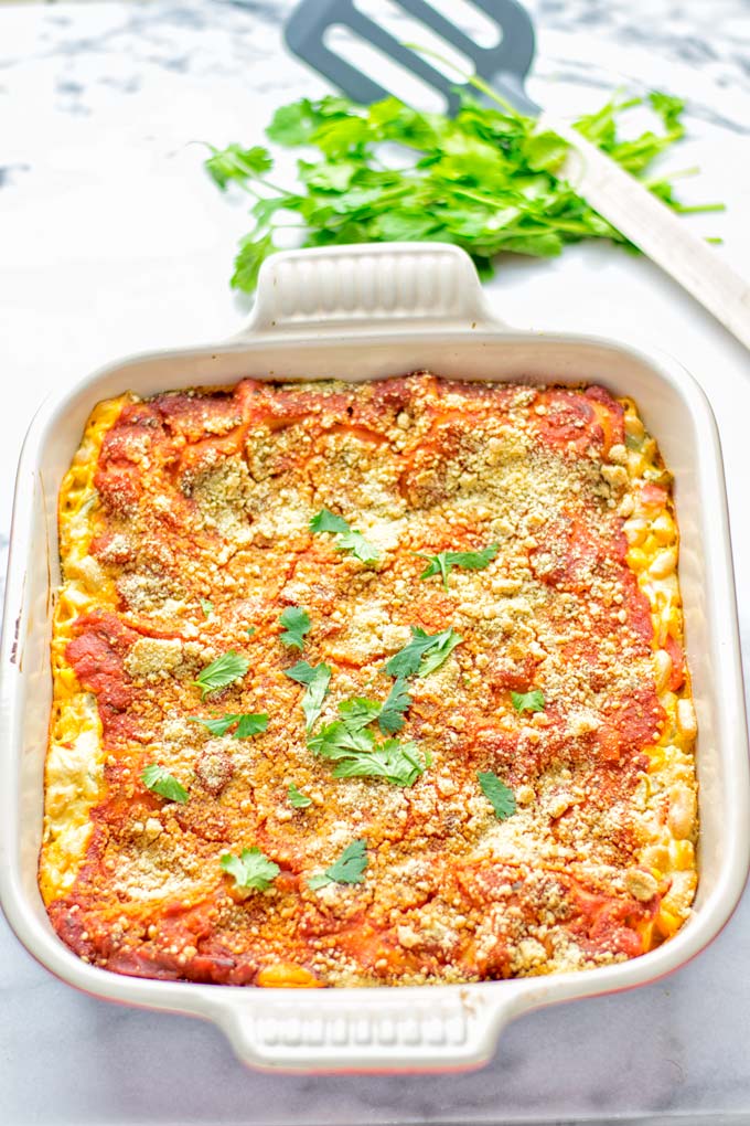 Super easy and insanely delicious White Chili Lasagna. Entirely vegan, gluten free and seriously so addictive. It's fantastic for dinner, lunch, meal preparation, work lunch that the whole family will love. Also a keeper for the holidays and date night. If you're looking for an easy lasagna recipe try this, now. #vegan #dairyfree #glutenfree #vegetarian #lasagna #mealprep #worklunchideas #whitechili #whitechilirecipes #holidays #dinner #lunch #datenightrecipesdinner #contentednesscooking