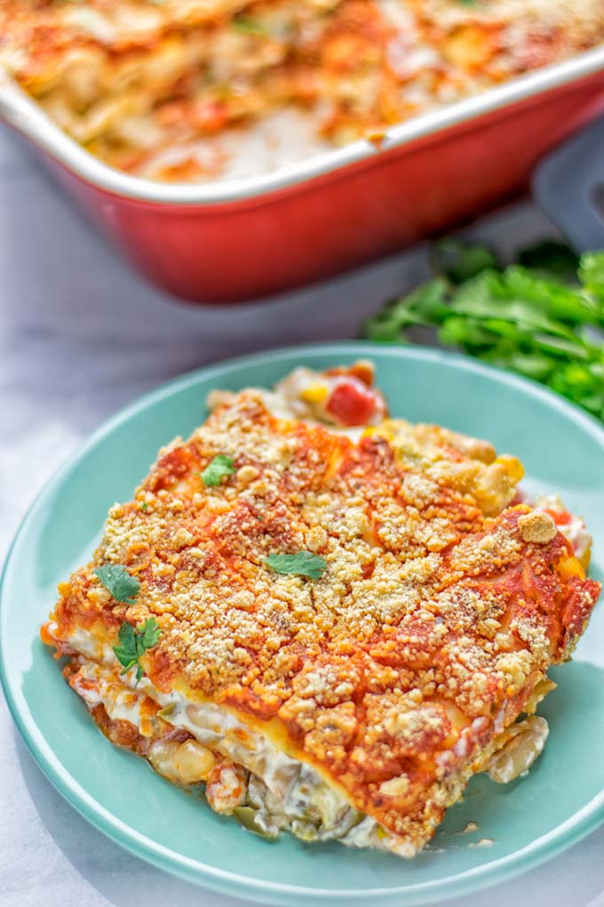 Super easy and insanely delicious White Chili Lasagna. Entirely vegan, gluten free and seriously so addictive. It's fantastic for dinner, lunch, meal preparation, work lunch that the whole family will love. Also a keeper for the holidays and date night. If you're looking for an easy lasagna recipe try this, now. #vegan #dairyfree #glutenfree #vegetarian #lasagna #mealprep #worklunchideas #whitechili #whitechilirecipes #holidays #dinner #lunch #datenightrecipesdinner #contentednesscooking