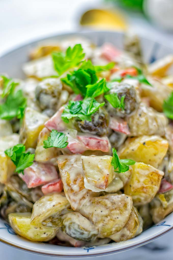 This Balsamic Brussels Sprouts Potato Salad is the ultimate comfort food and entirely vegan, gluten free. It's super delicious for dinner, lunch, meal prep and for Christmas or the holidays. Try it now and you can be sure the whole family will love it. #vegan #glutenfree #dairyfree #vegetarian #contentednesscooking #dinner #lunch #christmasfood #holidayfood #worklunchideas #mealprep #balsamicbrusselssprouts #potatosalad