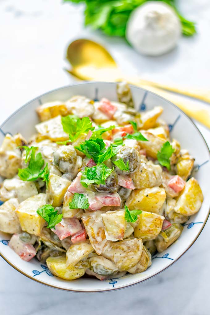 This Balsamic Brussels Sprouts Potato Salad is the ultimate comfort food and entirely vegan, gluten free. It's super delicious for dinner, lunch, meal prep and for Christmas or the holidays. Try it now and you can be sure the whole family will love it. #vegan #glutenfree #dairyfree #vegetarian #contentednesscooking #dinner #lunch #christmasfood #holidayfood #worklunchideas #mealprep #balsamicbrusselssprouts #potatosalad