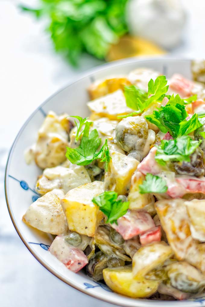 This Balsamic Brussels Sprouts Potato Salad is the ultimate comfort food and entirely vegan, gluten free. It's super delicious for dinner, lunch, meal prep and for Christmas or the holidays. Try it now and you can be sure the whole family will love it. #vegan #glutenfree #dairyfree #vegetarian #contentednesscooking #dinner #lunch #christmasfood #holidayfood #worklunchideas #mealprep #balsamicbrusselssprouts #potatosalad