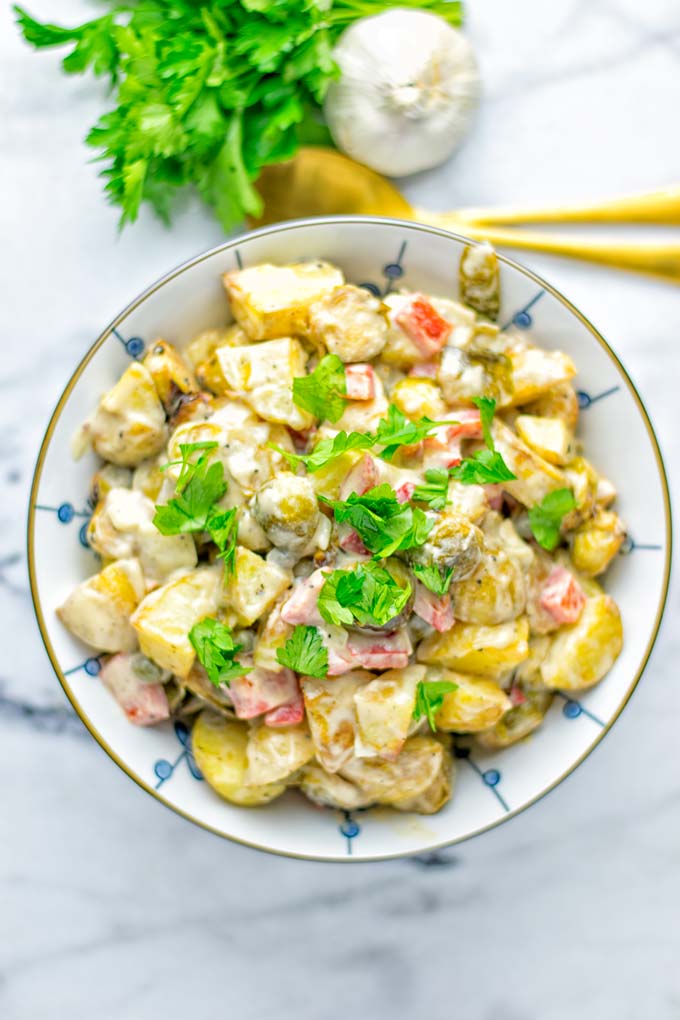 This Balsamic Brussels Sprouts Potato Salad is the ultimate comfort food and entirely vegan, gluten free. It's super delicious for dinner, lunch, meal prep and for Christmas or the holidays. Try it now and you can be sure the whole family will love it. #vegan #glutenfree #dairyfree #vegetarian #contentednesscooking #dinner #lunch #christmasfood #holidayfood #worklunchideas #mealprep #balsamicbrusselssprouts #potatosalad