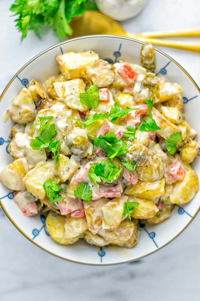 This Balsamic Brussels Sprouts Potato Salad is the ultimate comfort food and entirely vegan, gluten free. It's super delicious for dinner, lunch, meal prep and for Christmas or the holidays. Try it now and you can be sure the whole family will love it. #vegan #glutenfree #dairyfree #vegetarian #contentednesscooking #dinner #lunch #christmasfood #holidayfood #worklunchideas #mealprep #balsamicbrusselssprouts #potatosalad