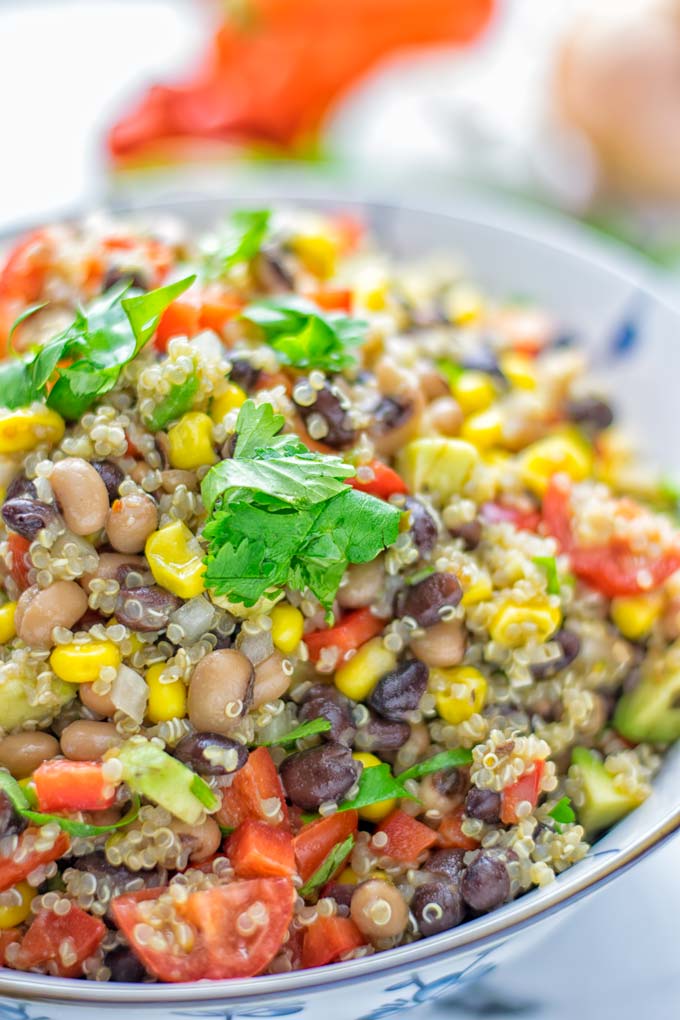 This Cowboy Caviar Quinoa Salad is naturally vegan, gluten free, and so satisfying. It has all the flavors you'll love and is super easy to make for dinner, lunch, meal prep and so much more. Enjoy and try it now You'll know how easy it can be. #vegan #glutenfree #dairyfree #vegetarian #cowboycaviar #quinoasalad #dinner #lunch #mealprep #worklunchideas #contentednesscooking #healthymeals #newyearhealthyeating #potluckideas #partyfood