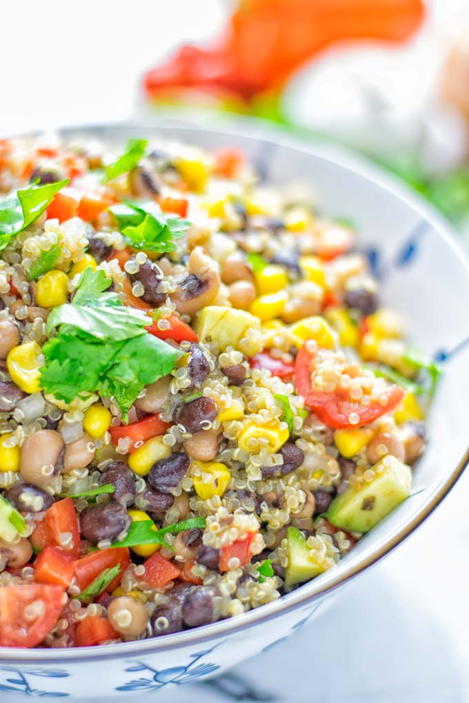 This Cowboy Caviar Quinoa Salad is naturally vegan, gluten free, and so satisfying. It has all the flavors you'll love and is super easy to make for dinner, lunch, meal prep and so much more. Enjoy and try it now You'll know how easy it can be. #vegan #glutenfree #dairyfree #vegetarian #cowboycaviar #quinoasalad #dinner #lunch #mealprep #worklunchideas #contentednesscooking #healthymeals #newyearhealthyeating #potluckideas #partyfood