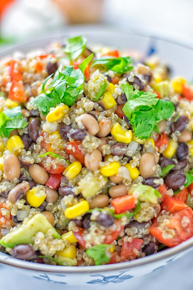 This Cowboy Caviar Quinoa Salad is naturally vegan, gluten free, and so satisfying. It has all the flavors you'll love and is super easy to make for dinner, lunch, meal prep and so much more. Enjoy and try it now You'll know how easy it can be. #vegan #glutenfree #dairyfree #vegetarian #cowboycaviar #quinoasalad #dinner #lunch #mealprep #worklunchideas #contentednesscooking #healthymeals #newyearhealthyeating #potluckideas #partyfood