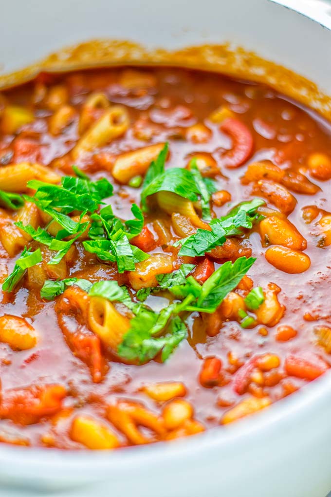 This Pasta Fagioli Soup is super easy to make in one pot and entirely vegan, gluten free. It's packed with so many delicious flavors and perfect for dinner, lunch, meal prep, work lunch and so much more. Try it and learn how easy it can be to make food for the whole family. #vegan #glutenfree #dairyfree #onepotmeals #vegetarian #contentednesscooking #mealprep #worklunchideas #dinner #lunch #pastafagiolisoup #20minutemeals