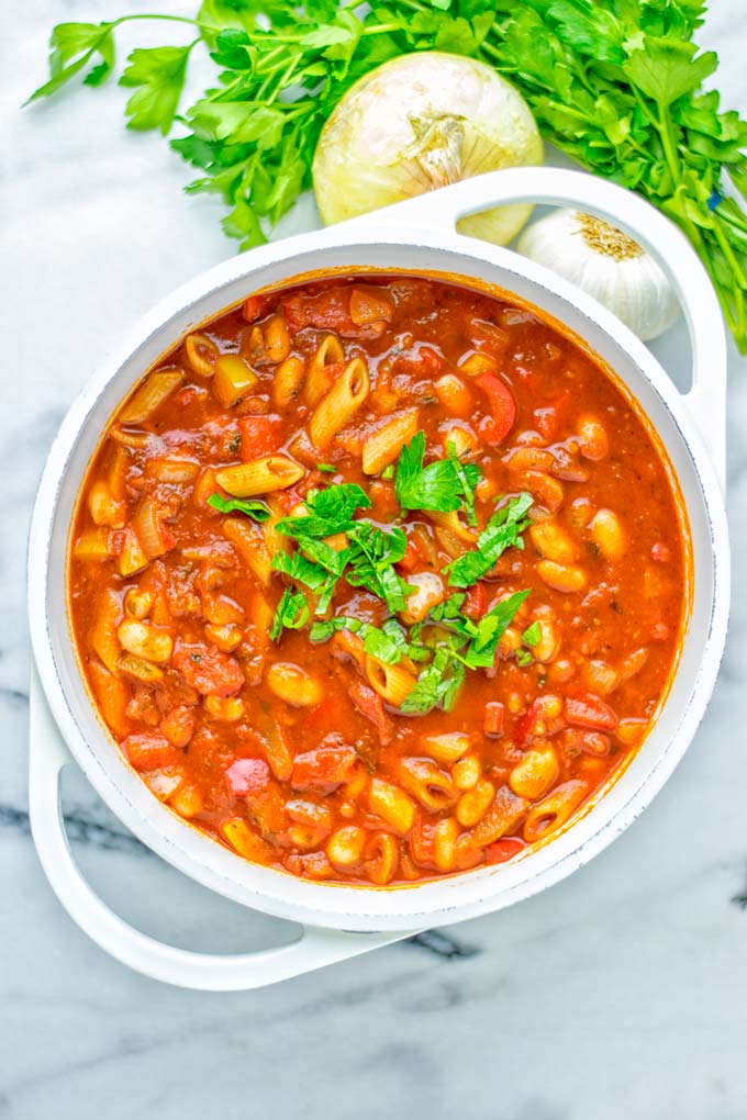 This Pasta Fagioli Soup is super easy to make in one pot and entirely vegan, gluten free. It's packed with so many delicious flavors and perfect for dinner, lunch, meal prep, work lunch and so much more. Try it and learn how easy it can be to make food for the whole family. #vegan #glutenfree #dairyfree #onepotmeals #vegetarian #contentednesscooking #mealprep #worklunchideas #dinner #lunch #pastafagiolisoup #20minutemeals
