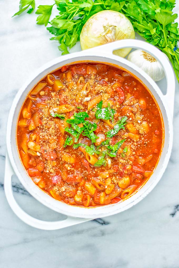 This Pasta Fagioli Soup is super easy to make in one pot and entirely vegan, gluten free. It's packed with so many delicious flavors and perfect for dinner, lunch, meal prep, work lunch and so much more. Try it and learn how easy it can be to make food for the whole family. #vegan #glutenfree #dairyfree #onepotmeals #vegetarian #contentednesscooking #mealprep #worklunchideas #dinner #lunch #pastafagiolisoup #20minutemeals