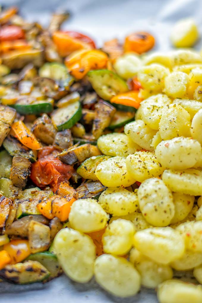 This Sheet Pan Ratatouille Gnocchi are super easy to make and naturally vegan, gluten free. It's made on a sheet pan which is a breeze for dinner, lunch, meal prep and work lunches. Try it now and the whole family will love it. #vegan #dairyfree #glutenfree #vegetarian #gnocchi #ratatouille #sheetpanmeals #contentednesscooking #dinner #lunch #mealprep #worklunchideas #familyfood #newyearhealtyeating