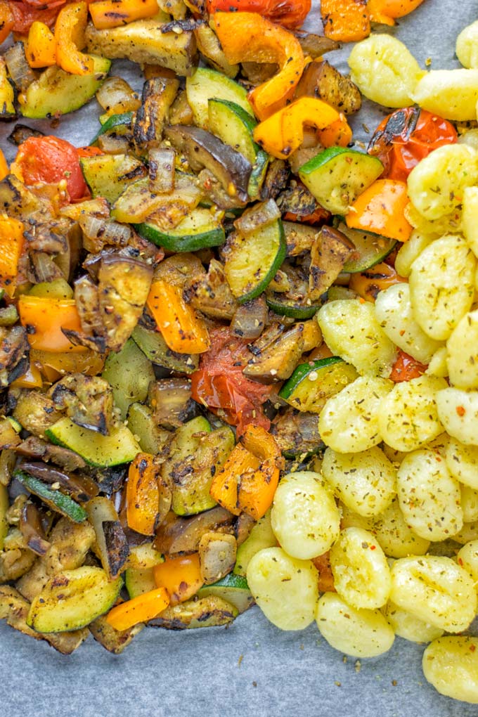 This Sheet Pan Ratatouille Gnocchi are super easy to make and naturally vegan, gluten free. It's made on a sheet pan which is a breeze for dinner, lunch, meal prep and work lunches. Try it now and the whole family will love it. #vegan #dairyfree #glutenfree #vegetarian #gnocchi #ratatouille #sheetpanmeals #contentednesscooking #dinner #lunch #mealprep #worklunchideas #familyfood #newyearhealtyeating