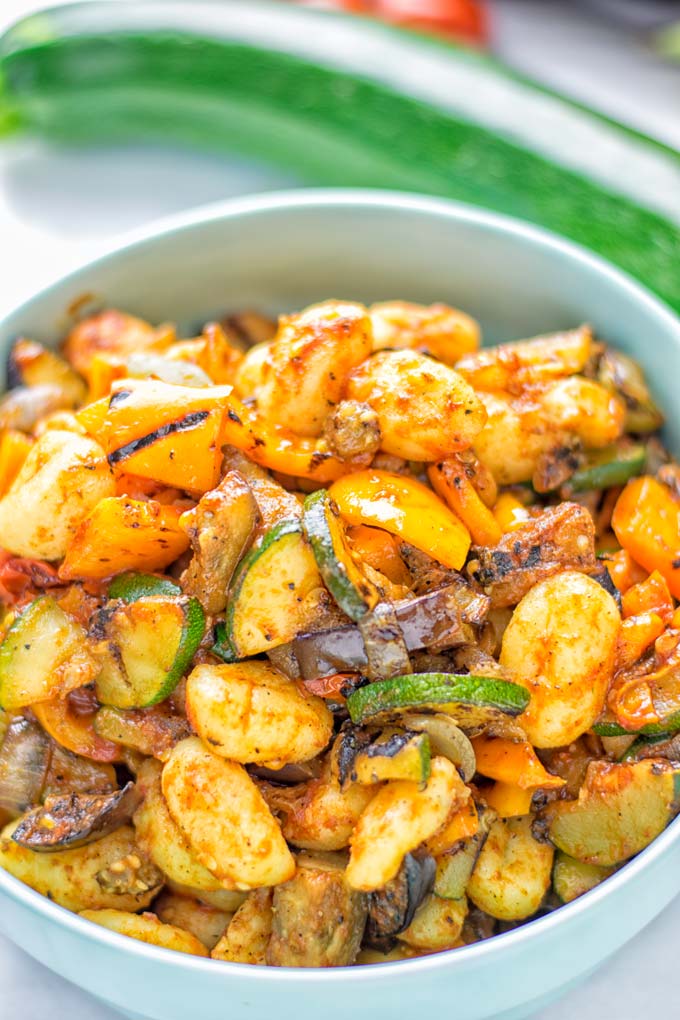 This Sheet Pan Ratatouille Gnocchi are super easy to make and naturally vegan, gluten free. It's made on a sheet pan which is a breeze for dinner, lunch, meal prep and work lunches. Try it now and the whole family will love it. #vegan #dairyfree #glutenfree #vegetarian #gnocchi #ratatouille #sheetpanmeals #contentednesscooking #dinner #lunch #mealprep #worklunchideas #familyfood #newyearhealtyeating
