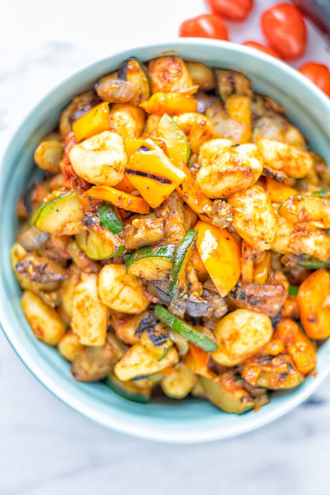 This Sheet Pan Ratatouille Gnocchi are super easy to make and naturally vegan, gluten free. It's made on a sheet pan which is a breeze for dinner, lunch, meal prep and work lunches. Try it now and the whole family will love it. #vegan #dairyfree #glutenfree #vegetarian #gnocchi #ratatouille #sheetpanmeals #contentednesscooking #dinner #lunch #mealprep #worklunchideas #familyfood #newyearhealtyeating