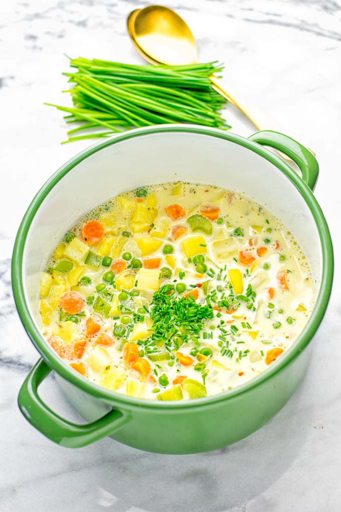 You won't believe this Vegan Pot Pie Soup is ready in 15 minutes. No one would guess it's vegan, gluten free, and dairy free. It's a satisfying meal made in one pot for lunch, dinner, meal prep even work lunches that you and your family will love. A time saving meal that is also a keeper for the holidays and Christmas. #vegan #glutenfree #dairyfree #vegetarian #onepotmeals #christmasfood #contentednesscooking #mealprep #dinner #lunch #worklunchideas #15minutemeals #holidaychristmas