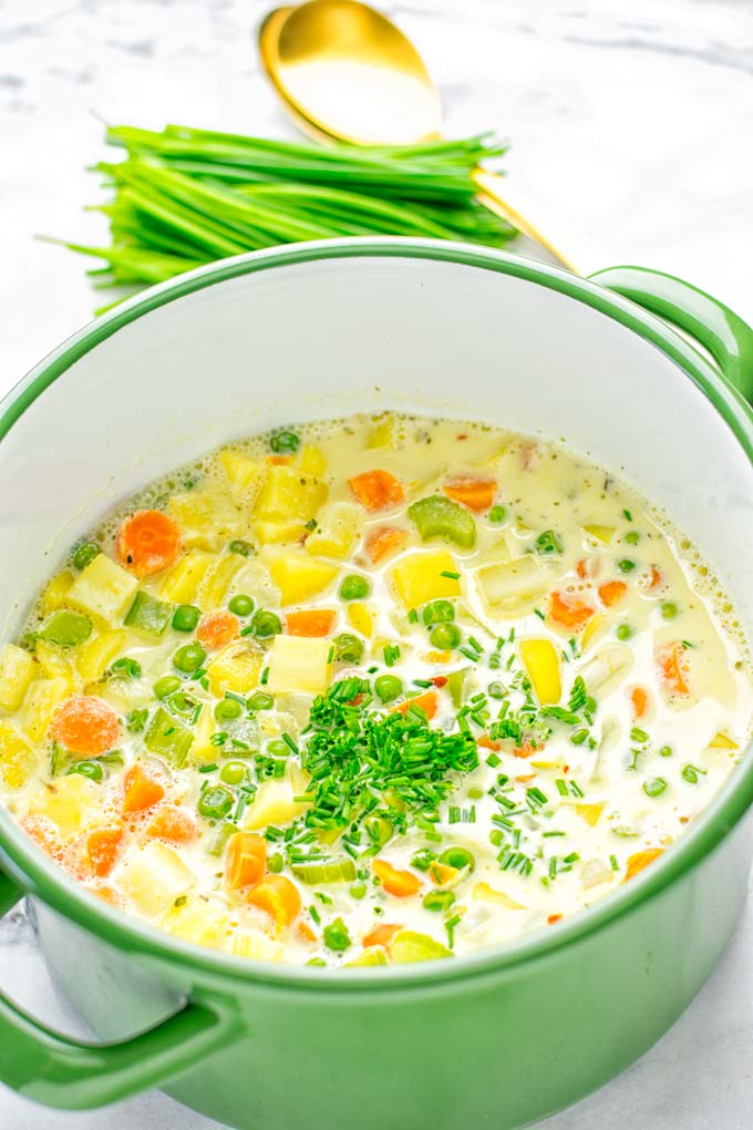 You won't believe this Vegan Pot Pie Soup is ready in 15 minutes. No one would guess it's vegan, gluten free, and dairy free. It's a satisfying meal made in one pot for lunch, dinner, meal prep even work lunches that you and your family will love. A time saving meal that is also a keeper for the holidays and Christmas. #vegan #glutenfree #dairyfree #vegetarian #onepotmeals #christmasfood #contentednesscooking #mealprep #dinner #lunch #worklunchideas #15minutemeals #holidaychristmas