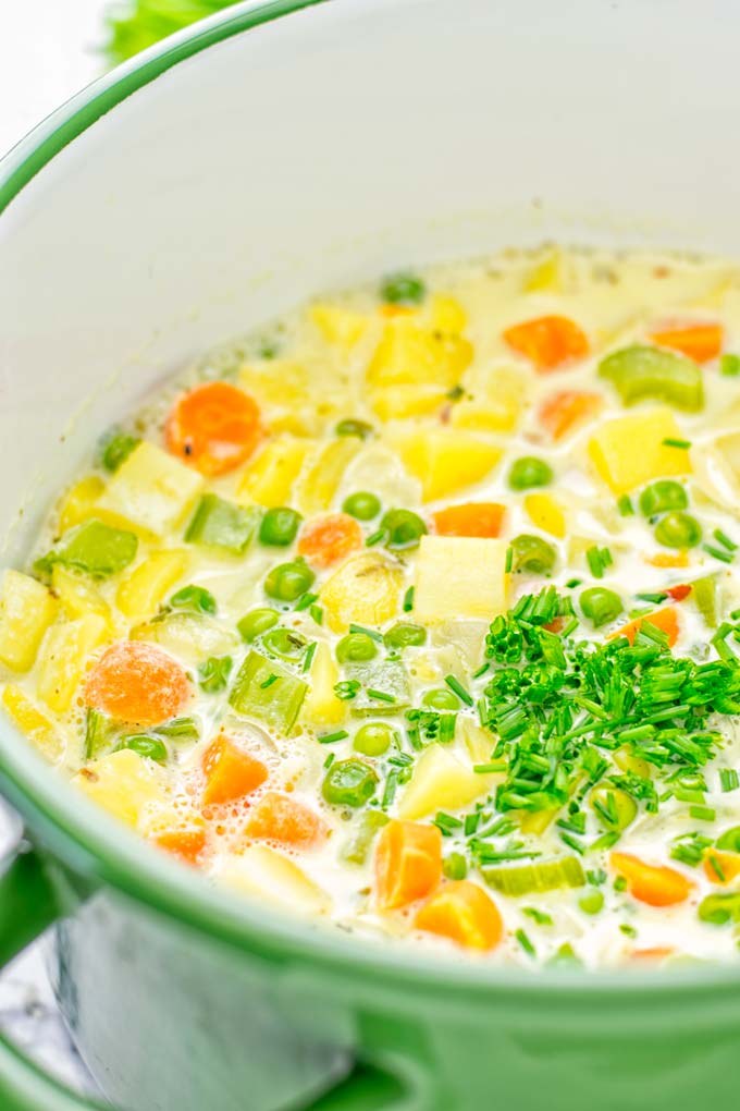 You won't believe this Vegan Pot Pie Soup is ready in 15 minutes. No one would guess it's vegan, gluten free, and dairy free. It's a satisfying meal made in one pot for lunch, dinner, meal prep even work lunches that you and your family will love. A time saving meal that is also a keeper for the holidays and Christmas. #vegan #glutenfree #dairyfree #vegetarian #onepotmeals #christmasfood #contentednesscooking #mealprep #dinner #lunch #worklunchideas #15minutemeals #holidaychristmas