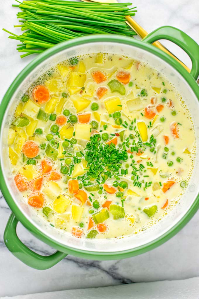You won't believe this Vegan Pot Pie Soup is ready in 15 minutes. No one would guess it's vegan, gluten free, and dairy free. It's a satisfying meal made in one pot for lunch, dinner, meal prep even work lunches that you and your family will love. A time saving meal that is also a keeper for the holidays and Christmas. #vegan #glutenfree #dairyfree #vegetarian #onepotmeals #christmasfood #contentednesscooking #mealprep #dinner #lunch #worklunchideas #15minutemeals #holidaychristmas