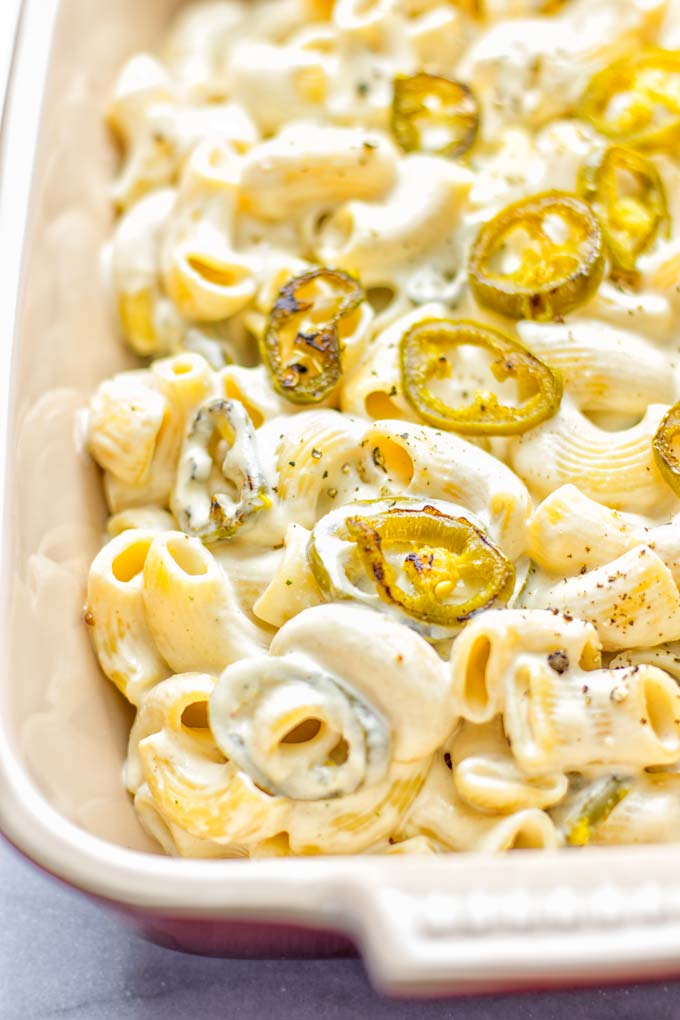 This Jalapeno Mac and Cheese is super easy to make and in 15 minutes on the table! It's creamy and perfectly spicy and entirely vegan, gluten free. An amazing option for dinner, lunch, meal prep, work lunch and so much more that the whole family will love. Try it for yourself and know this will be a staple in any house. #vegan #dairyfree #glutenfree #contentednesscooking #macandcheese #jalapeno #dinner #lunch #mealprep #worklunchideas #15minutemeals #familyfood #comfortfood