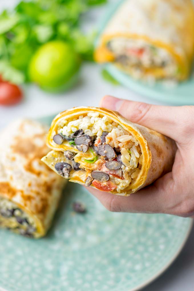 This Rice and Beans Quesarito is entirelly vegan, gluten free and so easy to make. It's cheesy, incredibly satisfying and so delicious for dinner, lunch, meal prep (reheat beautifully) and amazing for work lunches. An amazing dairy free alternative for everyone that the whole family will love. #vegan #glutenfree #dairyfree #vegetarian #contentednesscooking #quesarito #riceandbeans #dinner #lunch #worklunchideas #mealprep #quesadila #burrito