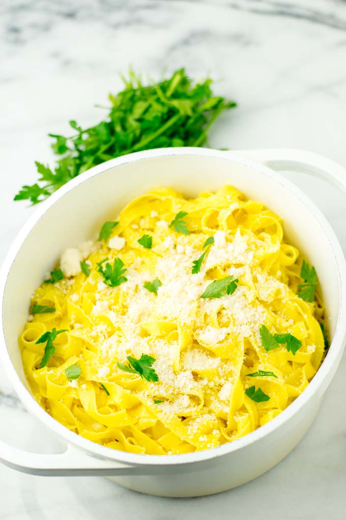 Pasta mixed with garlic butter, with a dash of vegan parm and parsley.