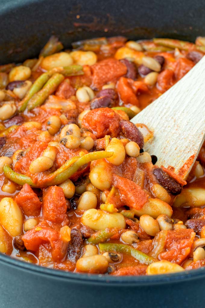These homemade Ranch Style Beans are are made with four kinds of beans to create the perfect texture. Super easy to make in one pot, crockpot ready, and seriously so easy plus delicious! Naturally vegan, gluten free once you've tried it, you want coming back for in no time. A keeper that the whole family will love, even the pickiest kids.