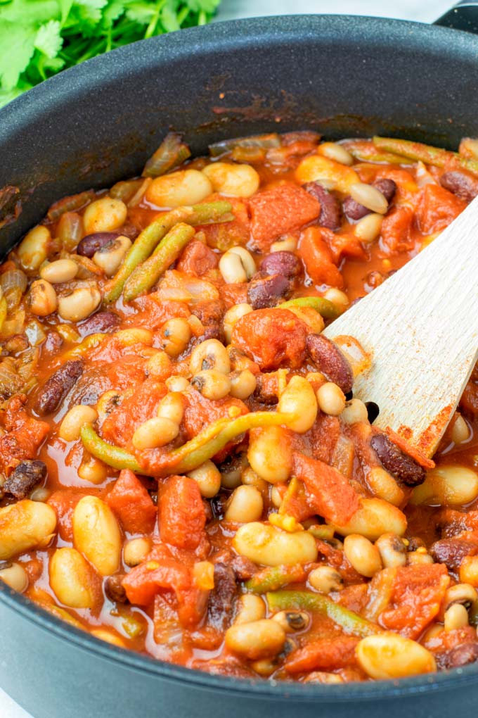 These homemade Ranch Style Beans are are made with four kinds of beans to create the perfect texture. Super easy to make in one pot, crockpot ready, and seriously so easy plus delicious! Naturally vegan, gluten free once you've tried it, you want coming back for in no time. A keeper that the whole family will love, even the pickiest kids.