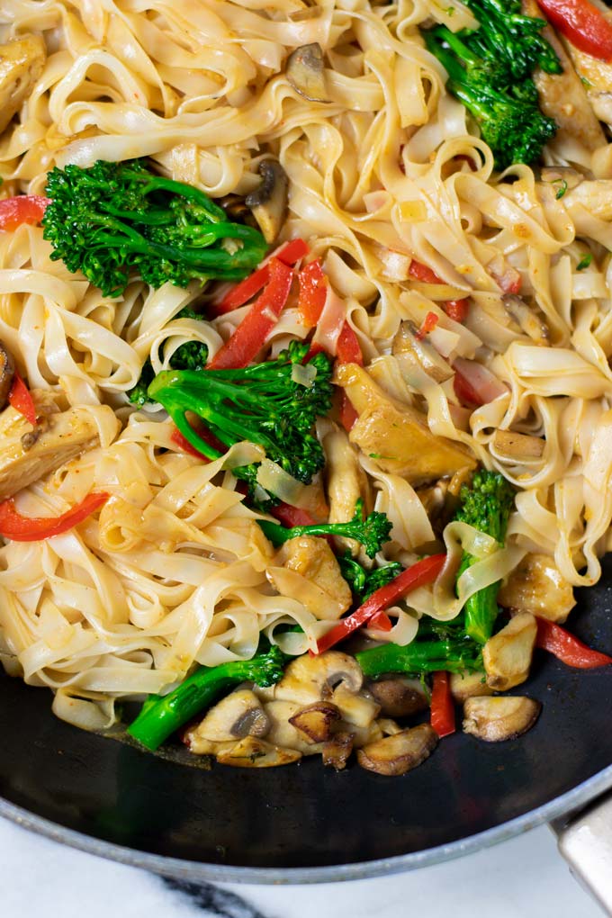 Top view on the wok with the Rice Noodles.