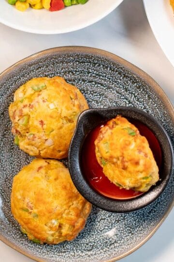 Close up view of three Cheese Puffs.