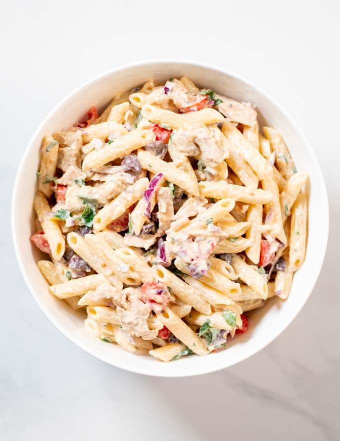 Chicken Pasta Salad is mixed in a large bowl.