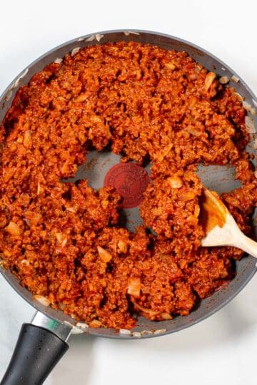 A pan of Michigan Sauce with a spoon.