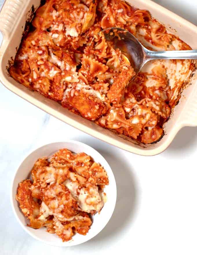 View of casserole dish and a serving on a small plate.