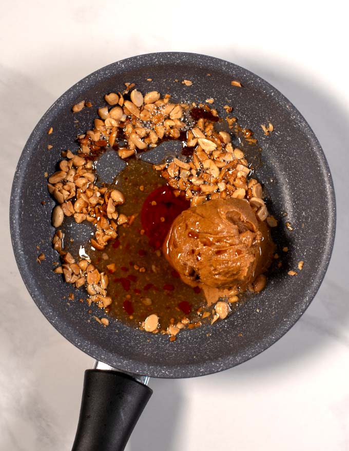 Top view of a saucepam with the ingredients of Vietnamese Peanut Sauce.