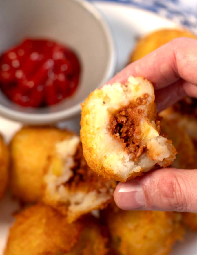 Closeup of a stuffed potato ball.