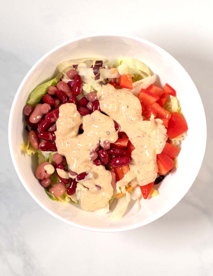 Pouting Southwest Ranch Dressing over salad.