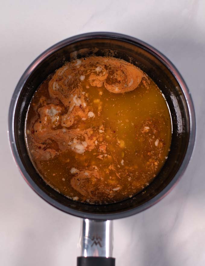 Mixed Bloves Sauce in a pan.